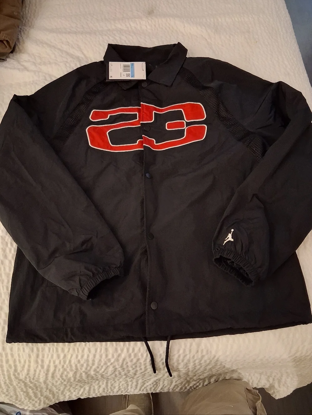 Jordan Men’s Black Windbreaker with Red 23 Patch
